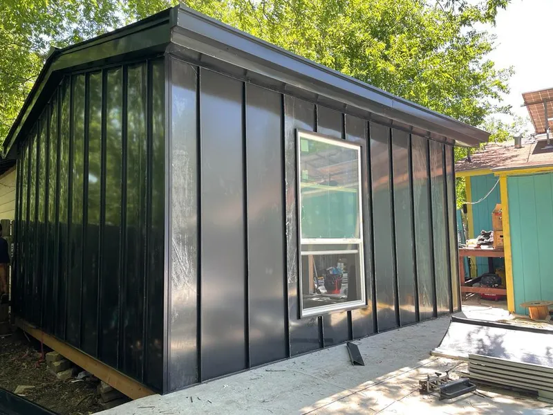 Black standing seam metal wall panels for Roof Inspection in Chickasha